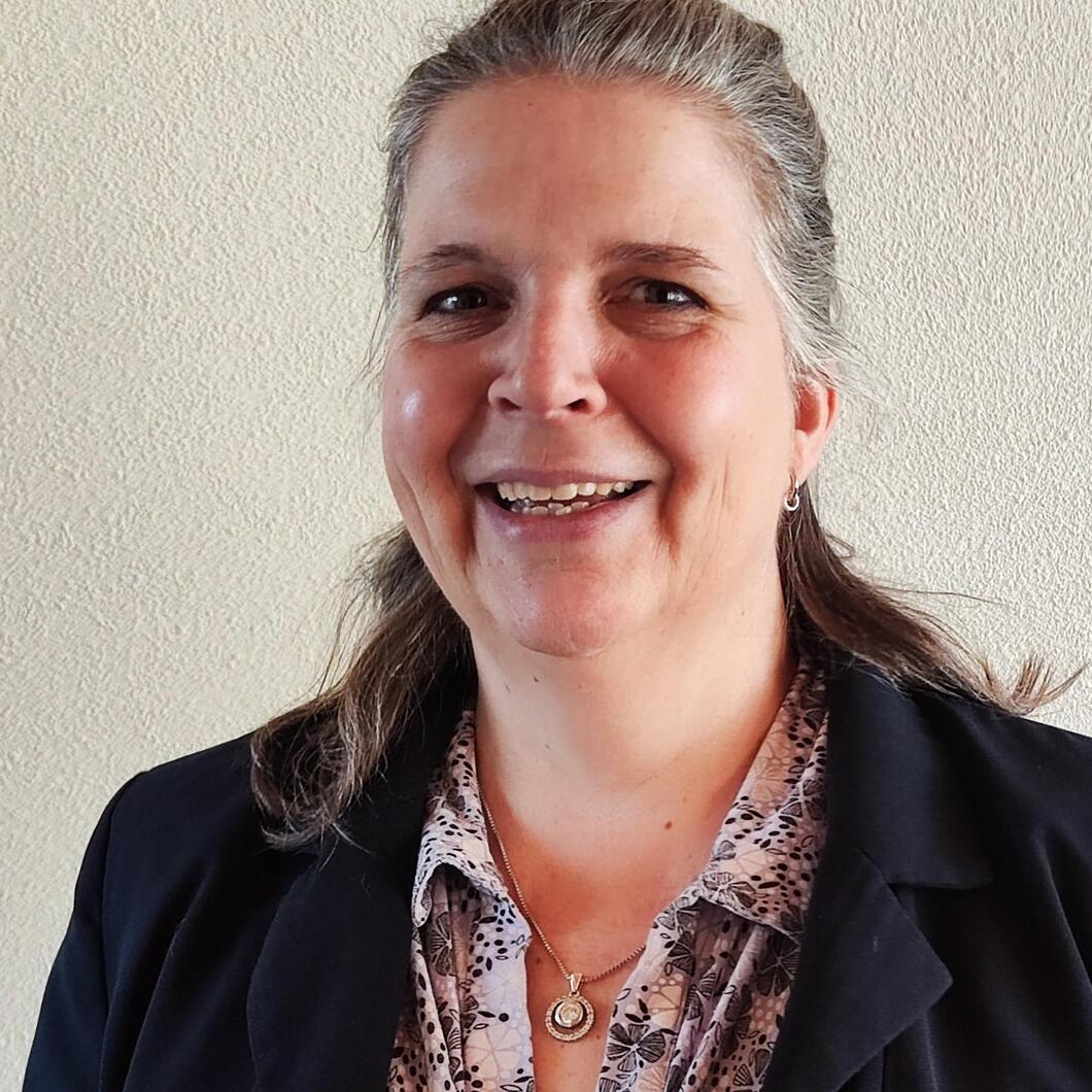 Een portretfoto van Mireille Sampimon-Ssembatya