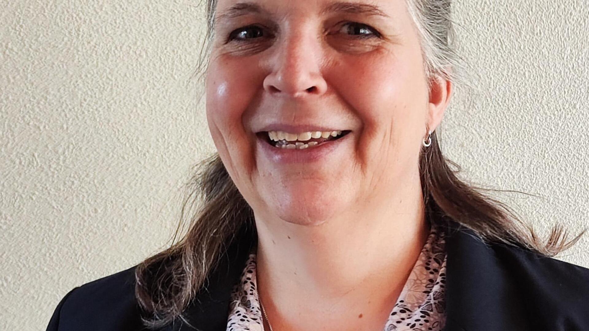 Een portretfoto van Mireille Sampimon-Ssembatya